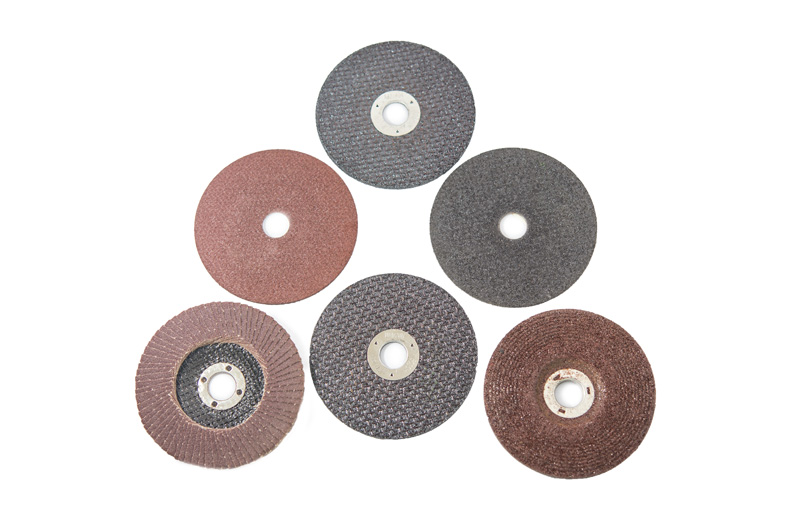 Abrasive disks for metal and stone grinding, cutting. Construction tools isolated